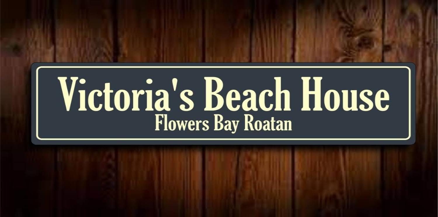 Victoria S Beach House And Snorkeling Center Flowers Bay Buitenkant foto